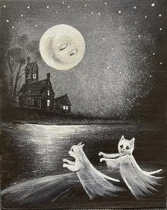 two cats are running in front of a house at night with the moon above them