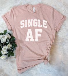 This "Single AF" design is the perfect shirt for anyone that is single with a sense of humor! All shirts are unisex (Male & Female) and any tee with rolled sleeves is done just for the picture. Ugly Christmas Sweater Couples, Newly Single, Single Af, Christmas Sweater Party, Ugly Christmas Sweater Party, Rolled Sleeves, Perfect Couple, Matching Couples, Perfect Shirt