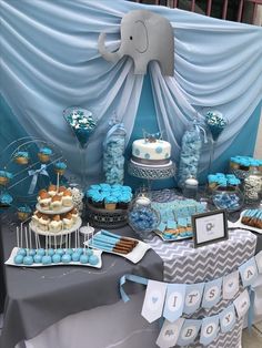 an elephant themed baby shower dessert table