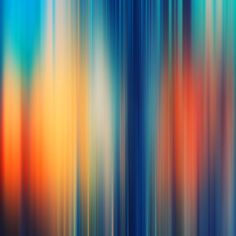 an abstract image of blue, orange and yellow colors with vertical lines in the background