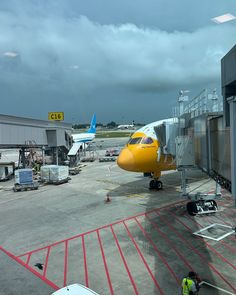 an airplane is parked at the airport terminal