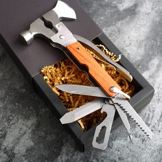 a box filled with different types of kitchen utensils