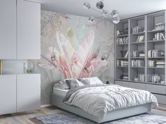 a bedroom with a bed, bookcases and a large mural on the wall