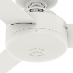 a white ceiling fan with the words hunter on it's blade and two blades