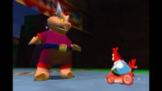 an image of a cartoon character on a skateboard next to another character in the video game mario kart