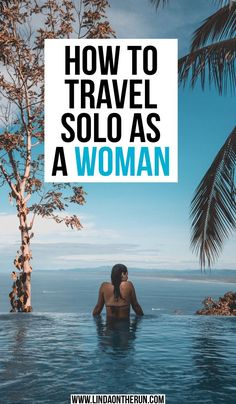 a woman sitting in the water with text overlay reading how to travel solo as a woman