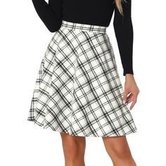 This skirt is timeless thanks to the plaid prints and easy a-line silhouette. Add plaid patterns to your transitional wardrobe with the skirt. It is made to sit high on the waist with an elasticated waistband for a flattering silhouette. Team yours with a chunky knit jumper and Chelsea boots for a versatile work-to-weekend style. You can pair this skirt with boots and overcoats for a warmer outfit. These fashionable clothes for women can not only be worn daily but can also be easily matched as a Skirt With Boots, Chunky Knit Jumper, Skirts With Boots, Skirt White, Weekend Style, Vintage Plaid, Women's Skirts, Warm Outfits, Trendy Clothes For Women