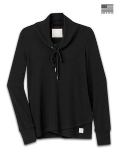 The Misty Top, made in the USA, is our famed casual style crafted from lightweight yet cozy waffle-knit thermal fabric. Perfect for a cool evening or curling up by the fire, this long-sleeve top features a drawcord cowl neck and an overlapped hem. With its relaxed fit, flattering silhouette, and longer length, it offers both breathability and warmth. It pairs perfectly with our Mavis Jogger for a cozy, coordinated look. Details: Cozy waffle knit pullover Mid weight brushed knit Cowl neck with dr Polo Quarter Zip, Quarter Zip Jacket, Knit Cowl, Black Xs, Knit Pullover, Top Pick, Waffle Knit, Knitted Pullover, The Fire