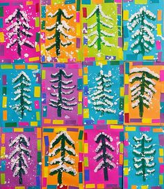 an art project made with colored paper and white snow on the trees in different colors