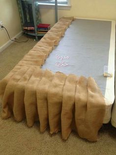 a bed that has been made with burlap