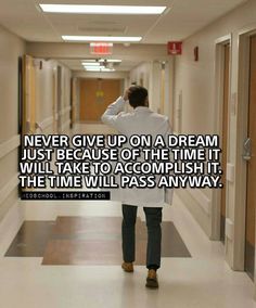 a man walking down a hallway with the caption never give up on a dream just because