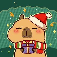 a brown bear wearing a santa hat and holding a gift