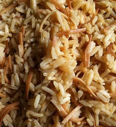 close up view of cooked rice on a plate