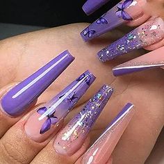 purple stiled nails with butterflies on them