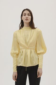 [Description]High neck light yellow blouse with Victorian sleeves. Comes with the detachable bra that wraps around the blouse. Both pieces can be worn together or separately.100% VIS Made in GeorgiaTatia is 180cm and she is wearin... Yellow Blouse Outfit, Victorian Sleeves, Ny Outfits, Tbilisi Georgia, Yellow Blouse, Pre Fall, Modest Fashion, Blouse Designs, Georgia