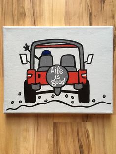 a painting of a red golf cart with the words life is good on it