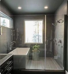 a bath room with a tub a sink and a window on the wall in it