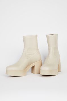 MARLOWE PLATFORM BOOT  Cream Vegan - Intentionally Blank Intentionally Blank, Slingback Mules, Platform Mules, Fall Staples, Vegan Boots, Platform Boots, Shoe Sale, Signature Style, Rubber Rain Boots