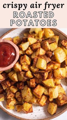 crispy air fryer roasted potatoes on a plate with ketchup