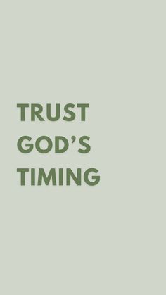 the words trust god's time on a green background