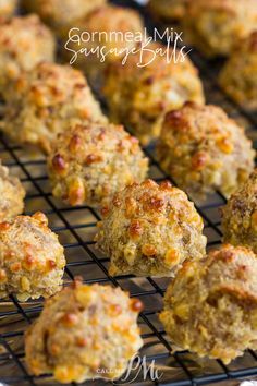 some meatballs are on a wire rack and ready to be cooked in the oven