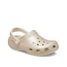 Crocs-Classic Glitter Clog Glam up your casual look in the Crocs Classic glitter clog. It features ventilation ports on the gleaming upper to keep the water out and Iconic Crocs Comfort technology that provides flexible, 360-degree comfort all day long. Glitter Champagne, Outerwear Women Winter, Base Layer Women, Crocs Clogs, Winter Shoes For Women, Glitter Shoes, Casual Slippers, Gold Sparkle, Purse Jewelry