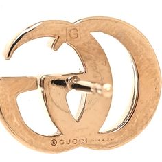 This is an authentic GUCCI Crystal Single GG Earring in Aurora Gold. This earring features an aged gold interlocking G logo with crystals. Gucci Jewelry, G Logo, Aurora, Gucci, Crystals, Stone, Gold