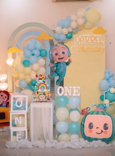 a birthday party with balloons and decorations