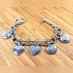 Sterling Silver Puffy Heart Dangle Charm Bracelet Signed 925 Ibb Thailand Measures 8 1/2" Long But Can Be Worn Shorter. It Features Five Different Puffy Heart Charms. It Is Signed Ibb Thailand And It's In Very Good Condition. Puffy Heart Charms, Puffy Heart, Jewelry Sterling Silver, Dangle Charms, Heart Charm, Womens Jewelry Bracelets, Sterling Silver Jewelry, Thailand, Charm Bracelet