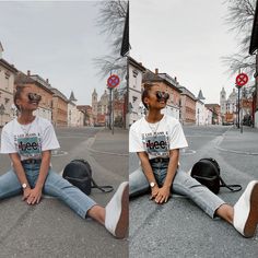 two young boys sitting on the ground with their feet up in the air and wearing sunglasses