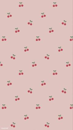 a pink background with cherries on it