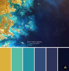 an aerial view of the ocean with blue and yellow colors in it, including sea from space