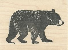 a rubber stamp with a bear on it