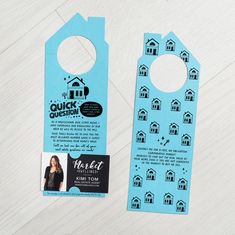 a blue door hanger with a house design on it and a business card attached to it