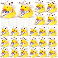 a bunch of rubber ducks with hats and bandannas on their heads, all in different positions