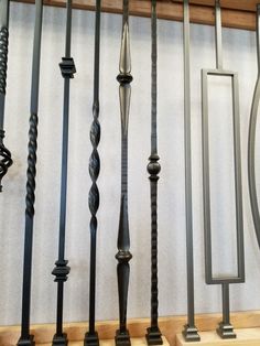 an assortment of wrought iron railings on display