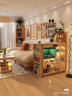 a living room filled with lots of furniture next to a wall mounted fish tank in the corner