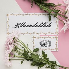 pink flowers are on top of a white and gold card with the word,'alhandullah '