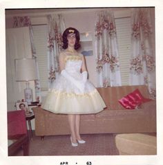 1963 formal dance prom dress knee length yellow white full skirt hair shoes early 60s found photo snapshot teen girl young women standing near sofa lamp curtains 60s Prom, Karen Spencer, Become Beautiful, Women Fashion Edgy, Maid Dress, Prom Night, Brides And Bridesmaids