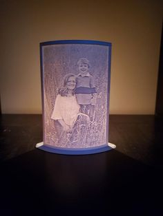 a glass with an image of two children on it