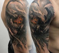 a man's half sleeve with an eagle and flames tattoo on his left arm