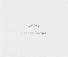 a white wall with the words creative home written in black on it and an image of a