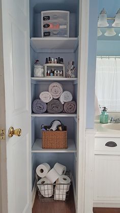 the bathroom is clean and ready to be used as a storage area for toiletries