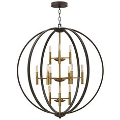 36" wide x 41" high. Canopy is 7" wide. Weighs 31 lbs. Comes with 10-feet of chain and 12-feet of wire. Sloped ceiling adaptable. Uses twelve maximum 60 watt candelabra base E12 light bulbs (not included). Shown with decorative tube bulbs. Euclid modern orb chandelier. From the Hinkley Lighting brand. Open globe orb profile allows the bulbs to be seen. Mixed metals look in Spaninsh Bronze and gold finishes. Steel construction.  The Euclid chandelier offers modern style for foyers, dining rooms and more. From the Hinkley brand, the design features an open orb shape. Inside the orb are three tiers of lights that branch off from a center column. The chandelier comes in a mixed metal finish, with the outer orb globe being in a Spanish Bronze finish, while the tiered lights and columns are in a Foyer Chandelier 2 Story, Foyer Pendant Lighting, Orb Chandelier, Foyer Chandelier, House Lighting, Foyer Lighting, Attic Spaces, Foyer Decorating, Transitional Modern