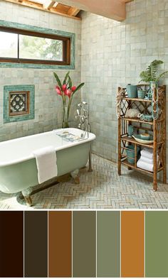 the bathroom is decorated in shades of brown, green and white with a claw foot tub