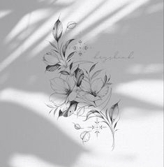 a drawing of some flowers on a white wall