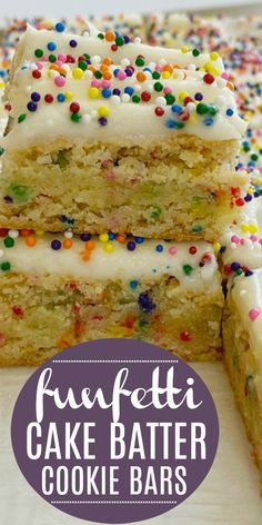 cake batter cookie bars with white frosting and colorful sprinkles on top