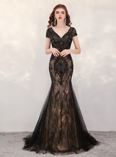 This appealing set includes a beaded high neck line and also illusion corset decorated with bead job. The back of this dress showcases an open back with a criss cross closure and also is completed with a significant mermaid skirt. Black Lace Evening Dress, Backless Formal Dresses, Gala Gown, Cap Sleeve Gown, Black Evening Gown, Black Mermaid, Dresses 2020, Lace Evening Dresses, Black Prom Dresses