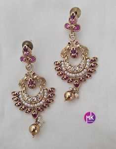 Premium Quality gold finish AD stones long Earrings with hanging pearls and gold bead - MK Fashionkart - Fashion Jewelry Material: Premium quality, Gold finish, AD stones, Pearls MK Fashionkart Indian Fashion Jewelry Suitable for Saree/Salwar/party wear dresses   SHIPPING : Ready to ship in 1 business day. This item will be shipped from The United States. Jewelry care instructions : 1. Please wipe the jewelry with a piece of cotton cloth after usage.  2. Store the jewelry in a cool, dry and air Luxury Gold-plated Chandelier Dangle Earrings, Elegant Meenakari Gold-plated Pearl Earrings, Gold-tone Gold Plated Chandelier Earrings, Indian Fashion Jewellery, Jewelry Care Instructions, Party Wear Dresses, Long Earrings, Gold Beads, Gold Finish