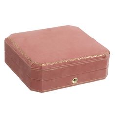 a pink leather box with gold trimmings